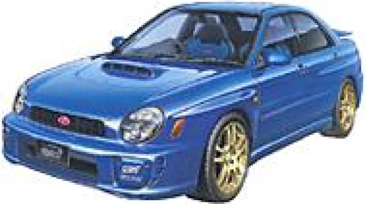 Subaru Impreza WRX STi 2001 Straßenversion mit Felgen in Gold lackiert. mehrfarbige Rückleuchten.Karosserie in Blau